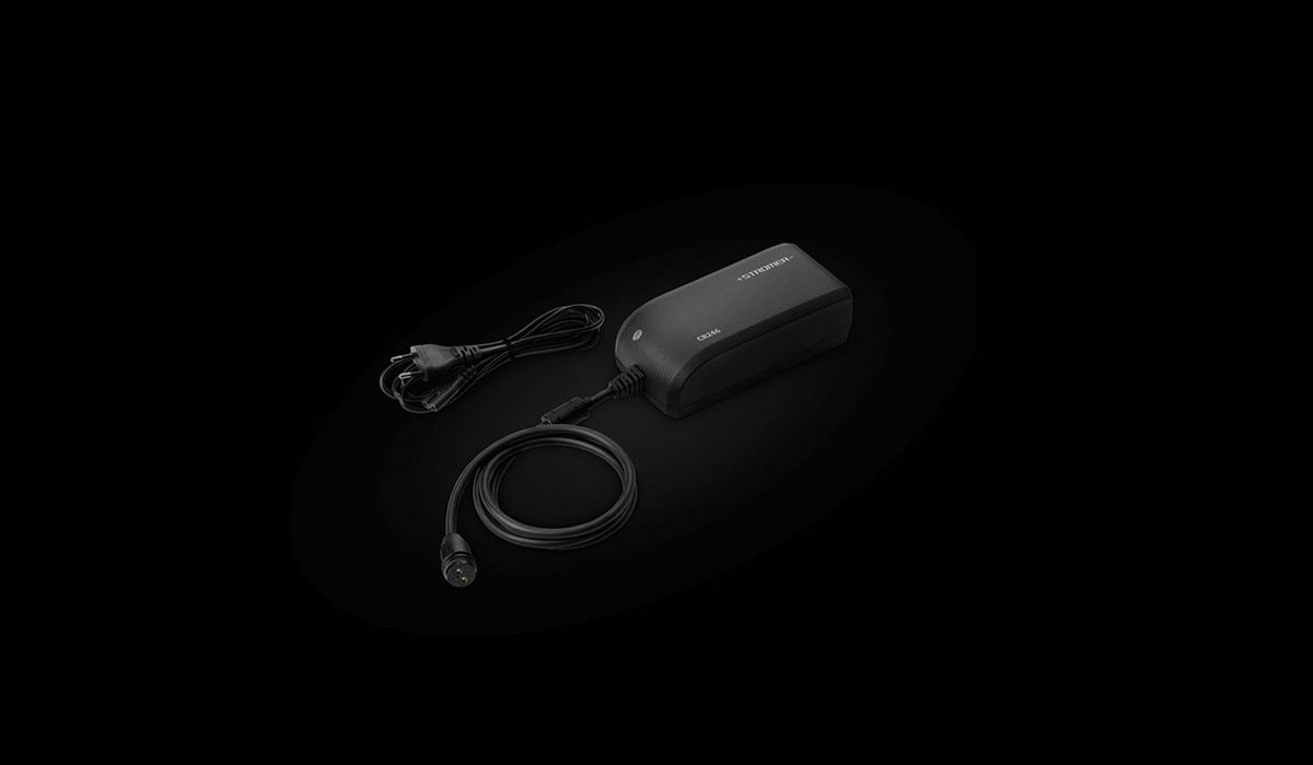 Stromer e-bike chargers for quiet, fast charging at home or on the road.