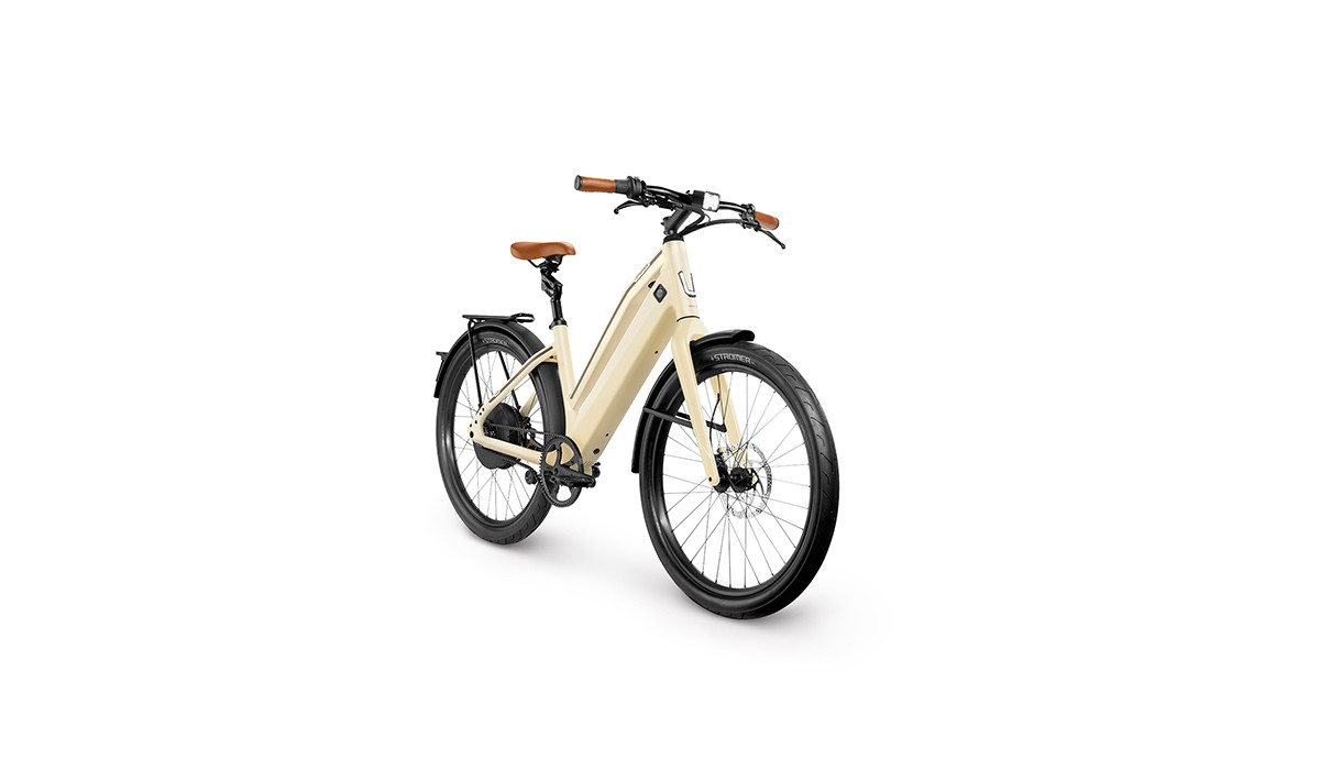 Nieuw: Stromer ST2 Special Edition e-bike met verfijnde Ivory Cream speciale laklaag met comfortframe, geveerde zadelpen en Stromer Copenhagen Basket.